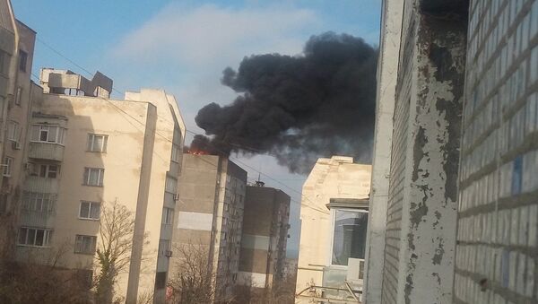 Взрыв газовых баллонов и пожар на крыше девятиэтажного дома в Щелкино