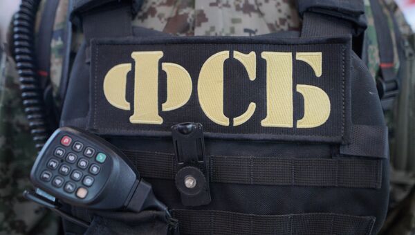 Бронежилет и рация сотрудника ФСБ РФ. Архивное фото