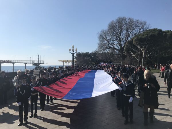 Участники шествия в Ялте в рамках празднования годовщины Крымской весны. 16 марта 2019 Участники шествия в Ялте в рамках празднования годовщины Крымской весны. 16 марта 2019