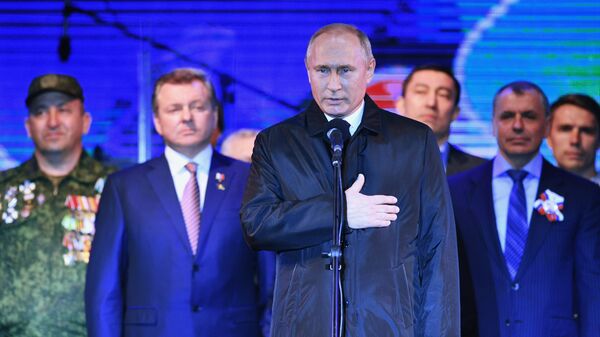 Президент РФ Владимир Путин на концерте в Симферополе по случаю пятилетия воссоединения Крыма с Россией. 18 марта 2019