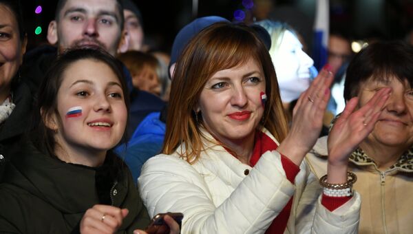 Зрители на концерте в Симферополе в честь пятилетия воссоединения Крыма с Россией