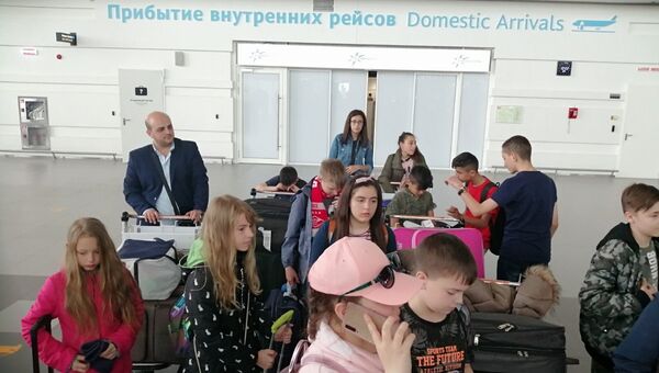 В аэропорт Симферополь прибыли дети из Сирии