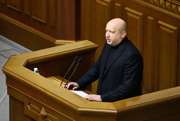 Секретарь совета нацбезопасности и обороны (СНБО Украины) Александр Турчинов на заседании Верховной рады Украины в Киеве Секретарь совета нацбезопасности и обороны (СНБО Украины) Александр Турчинов на заседании Верховной рады Украины в Киеве