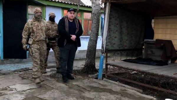 Задержание активиста незаконного вооруженного добровольческого батальона имени Н. Челебиджихана Эдема Кадырова