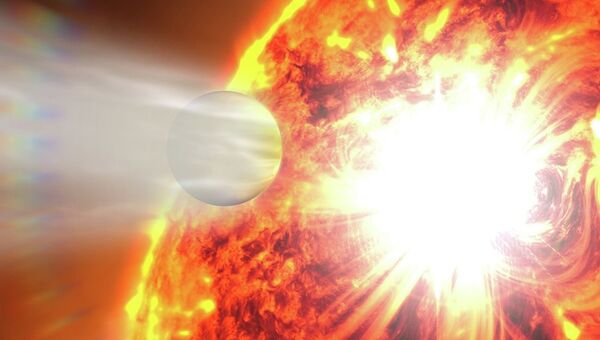 Испарение атмосферы планеты HD 189733b под действием сверхмощной вспышки на звезде