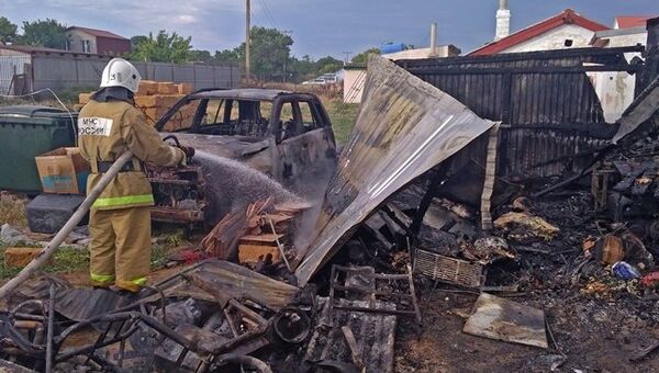 Пожар во дворе частного дома в селе Оленевка