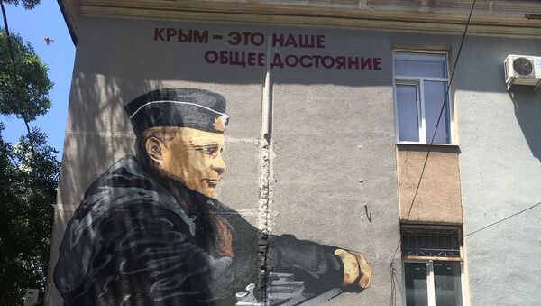 Граффити с изображением президента России Владимира Путина в Симферополе