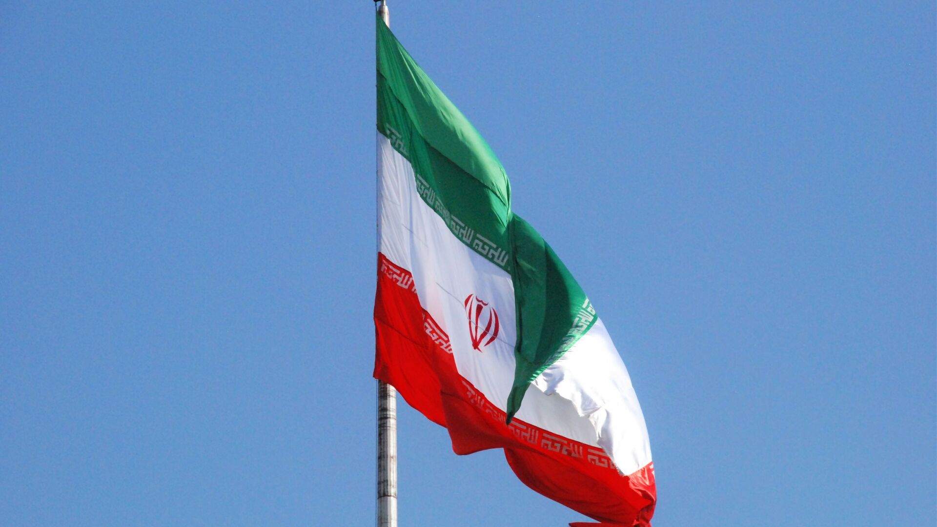 Флаг Ирана на одной из улиц Тегерана - РИА Новости, 1920, 19.01.2023