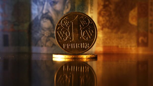 Монета и денежные купюры гривны Украины